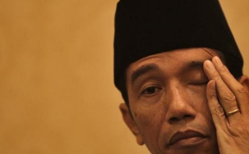 7520150526_020249_harianterbit_jokowi_kopiah.jpg